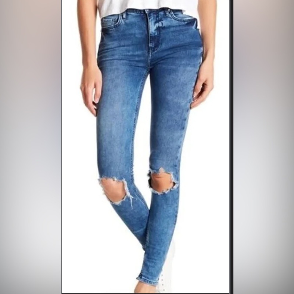 Free People busted knee jeans